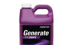 A purple plastic container labeled "Generate for Crops" by Agnition, with a white cap and handle, designed for agricultural use.