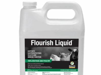 A white plastic container labeled "Flourish Liquid" with images of a piglet, chick, and cow. The label states it supports gastrointestinal health and immune function for livestock and poultry.