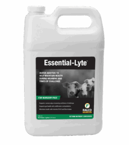 A white plastic container labeled "Essential-Lyte" for nursery pigs, featuring an image of two piglets. The label mentions it is a water additive to help maintain health during weaning and times of challenge.