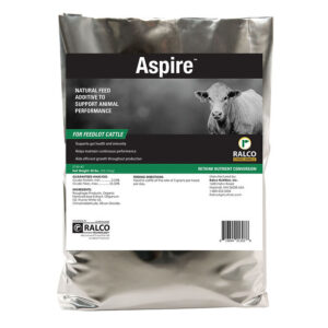 Aspire is a silver bag with a cow image, produced by Ralco. It's a natural feed additive for feedlot cattle to support their health and performance.