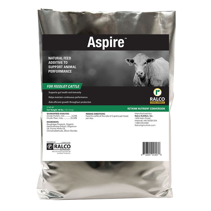 Aspire is a silver bag with a cow image, produced by Ralco. It's a natural feed additive for feedlot cattle to support their health and performance.