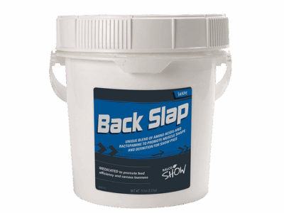 Back Slap is a white plastic tub with a handle and a blue label, marketed for show animals. The label highlights amino acids to promote muscle shape and definition.