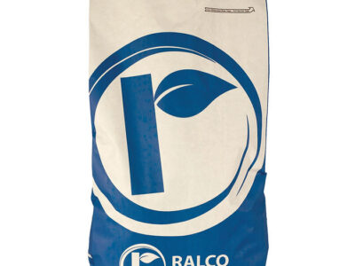 A large white and blue bag labeled "Birthright Bridge" with a circular leaf logo, used for packaging animal feed or nutrition products.