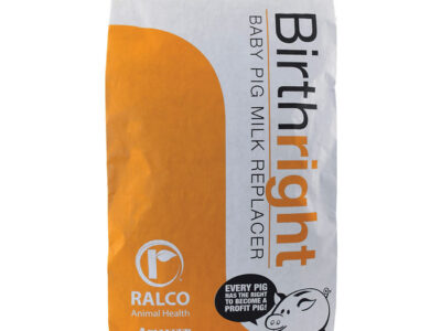 A white and orange bag labeled "Birthright NAP" shows a cartoon pig and the slogan, "Every pig has the right to become a profit pig!" The brand name "Ralco Animal Health" is also visible.