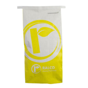 A white and yellow paper bag labeled "Essential DRY XP OMRI Listed" with a circular leaf logo near the top center.