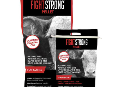 Two bags of Fight Strong Pellet for Cow/Calf animal feed with bold red and black branding, cow images, and text promoting essential oils and immune support benefits. Suitable for cattle, sheep, goats, deer, llamas, and alpacas.