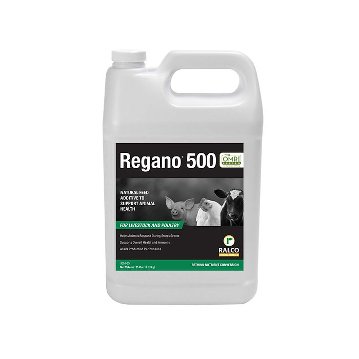 A white plastic jug labeled "Regano 500 OMRI Listed" with images of a piglet, lamb, chick, and cow is a natural feed additive for livestock and poultry, produced by Ralco.