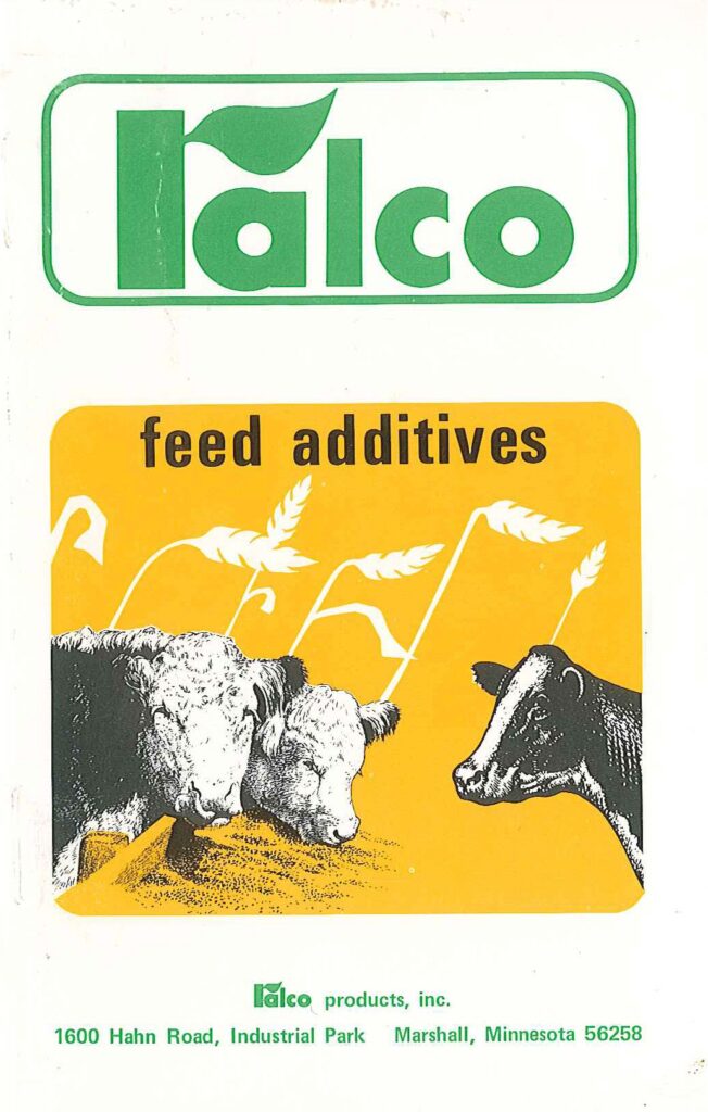 Vintage advertisement featuring three cows eating grass below the words "feed additives" on a yellow background, with the "Ralco" logo and company address at the bottom.