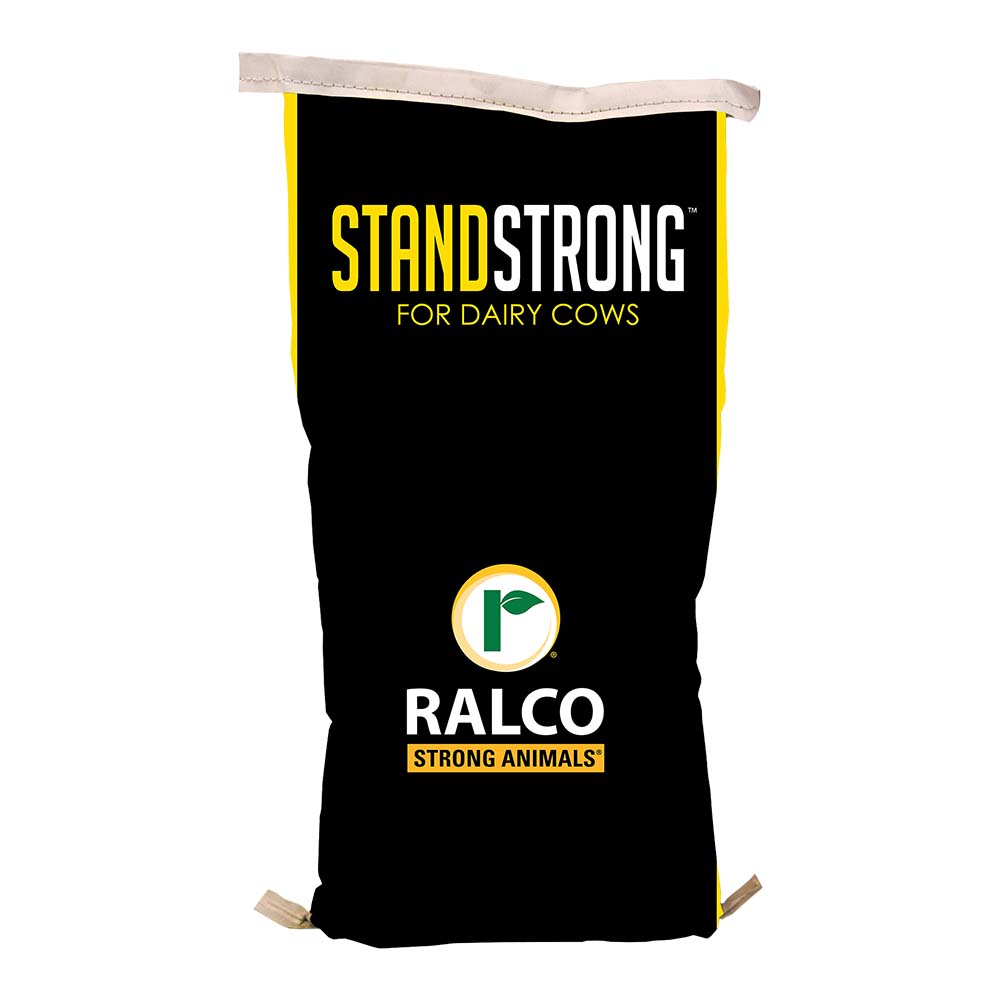A black and yellow bag labeled "Stand Strong™ for Dairy Cows" with the Ralco logo and "Ralco Strong Animals" displayed beneath the logo.